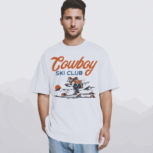 a man wearing white cowboy ski tshirt