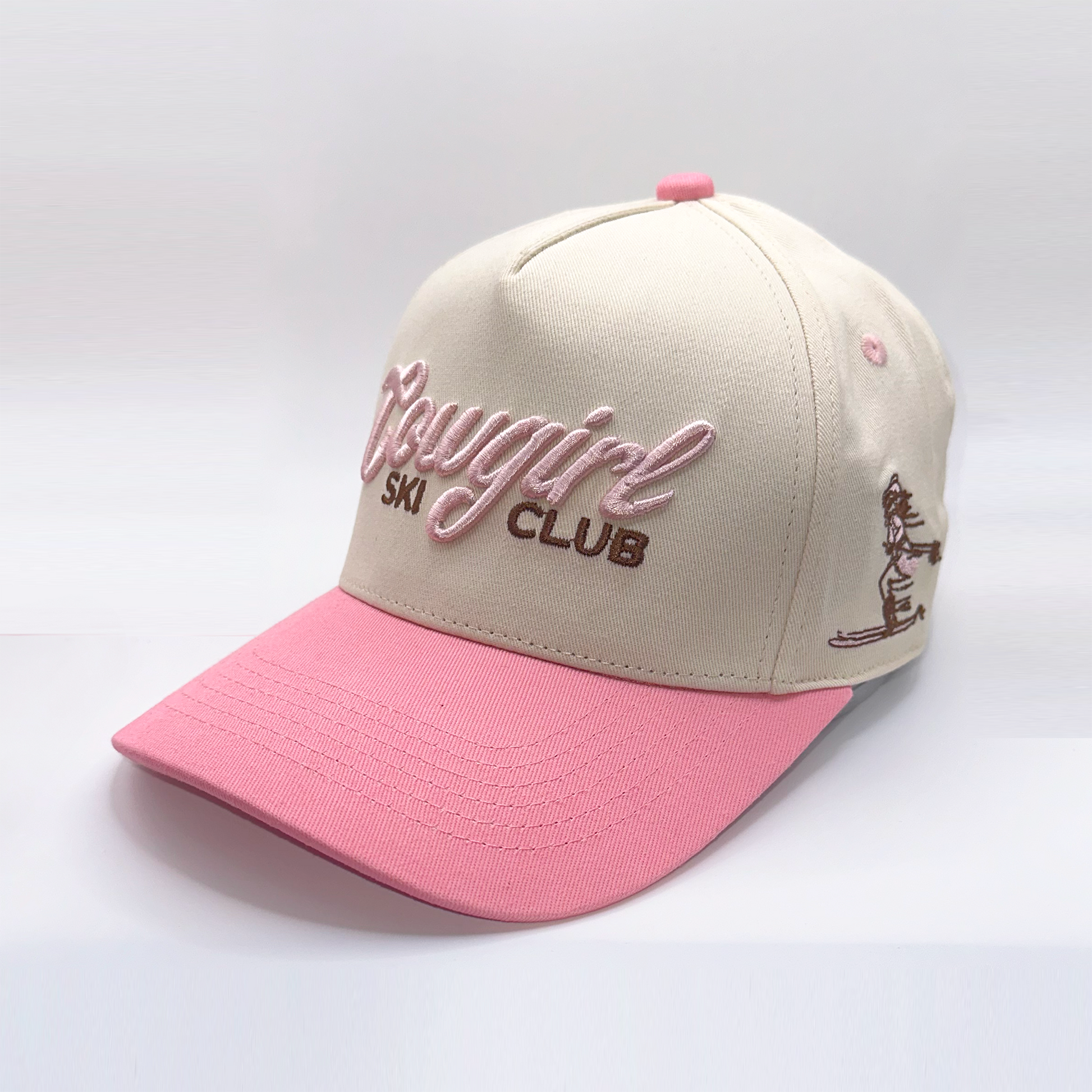 a white and pink cowgirl hat